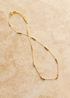 Crushed gold chain necklace from Indigo + Wolfe 