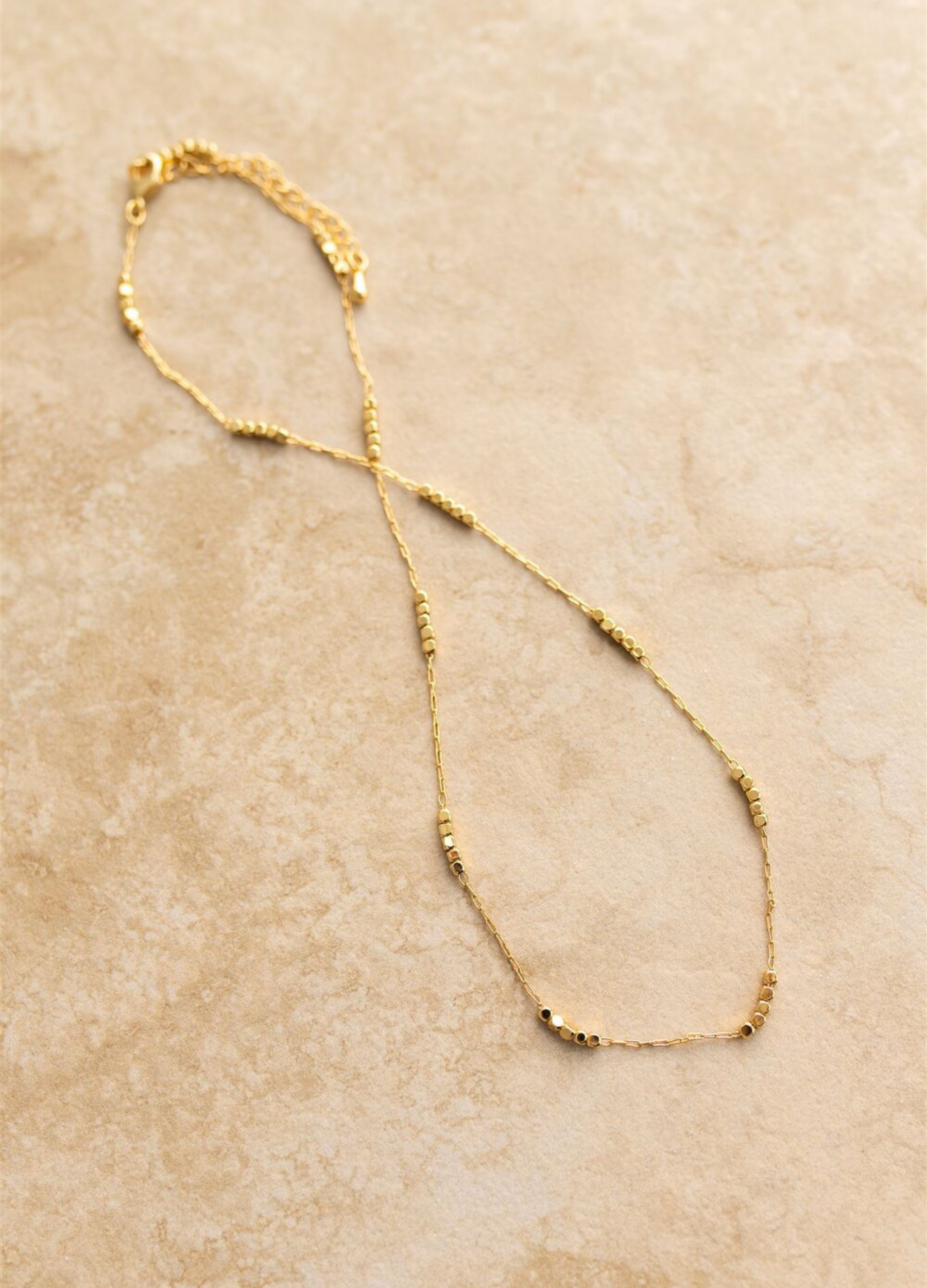 Crushed gold chain necklace from Indigo + Wolfe 