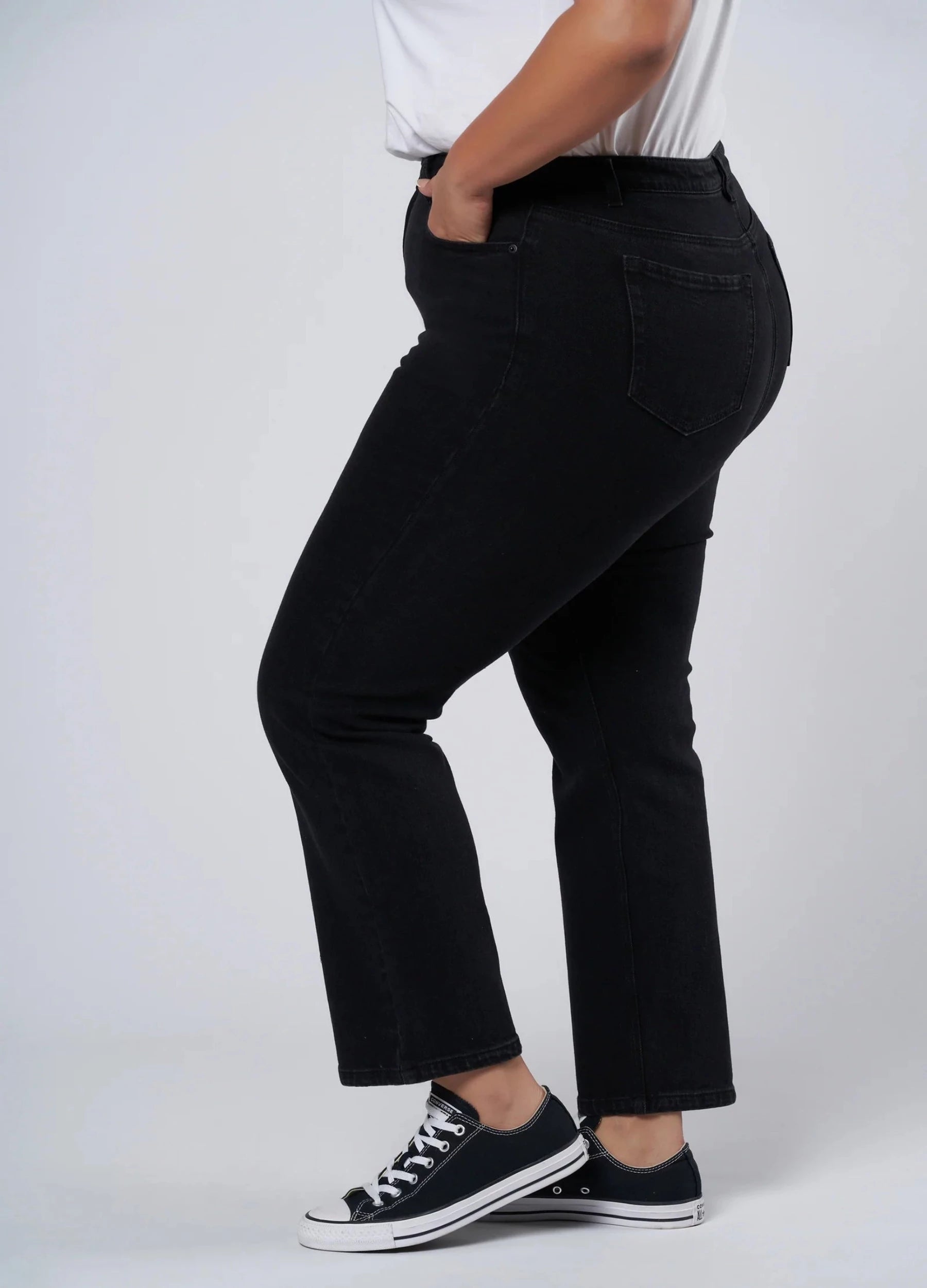 Plus size black jean cut for curves, cropped at hem