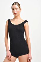 Black seersucker knitted playsuit from One Peace 