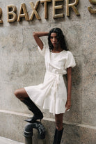 White sustainable cotton mini dress with belt