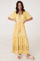 Yellow floral maxi dress with button through details and elasticated ties